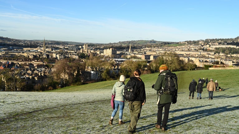 Walkers in Smallcombe Vale on the Bath Skyline